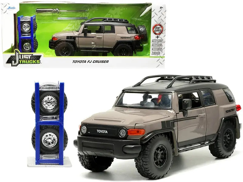 Toyota FJ Cruiser with Roof Rack Brown and Black "Toyo Tires" with Extra Wheels "Just Trucks" Series 1/24 Diecast Model Car by Jada Jada