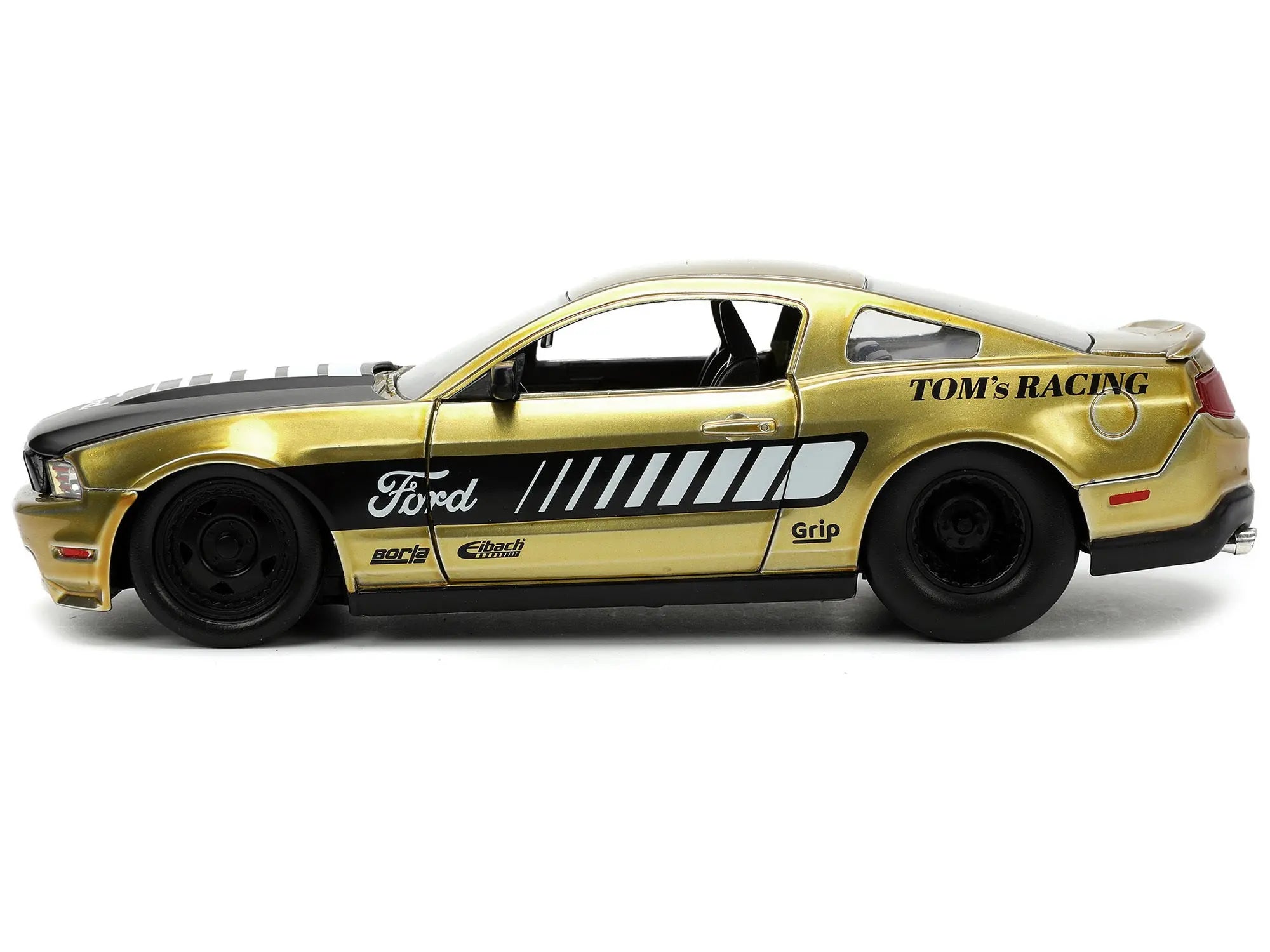 2010 Ford Mustang GT Gold Metallic with Black Graphics and Hood "Tom's Racing" "Bigtime Muscle" Series 1/24 Diecast Model Car by Jada Jada