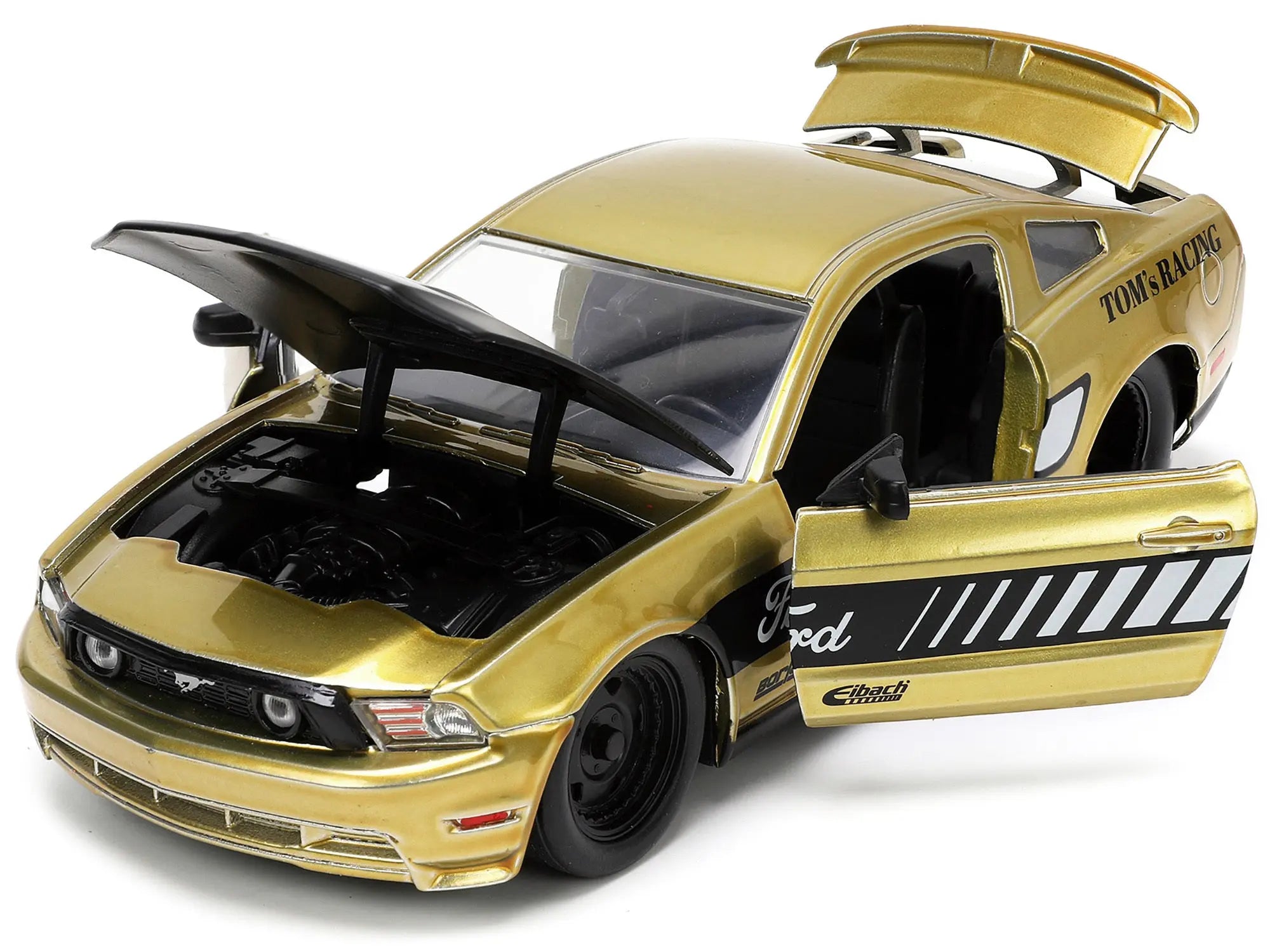 2010 Ford Mustang GT Gold Metallic with Black Graphics and Hood "Tom's Racing" "Bigtime Muscle" Series 1/24 Diecast Model Car by Jada Jada