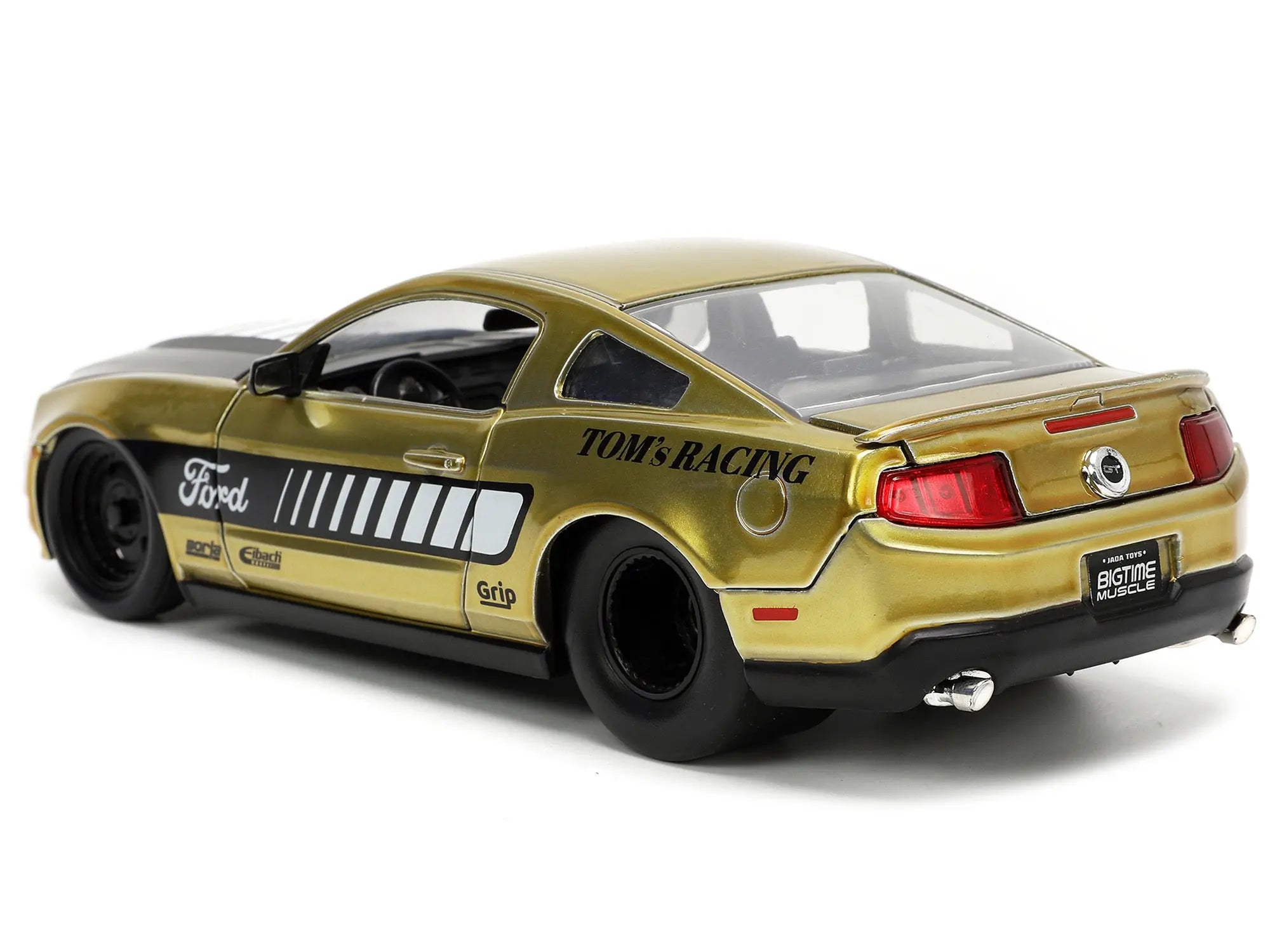 2010 Ford Mustang GT Gold Metallic with Black Graphics and Hood "Tom's Racing" "Bigtime Muscle" Series 1/24 Diecast Model Car by Jada Jada