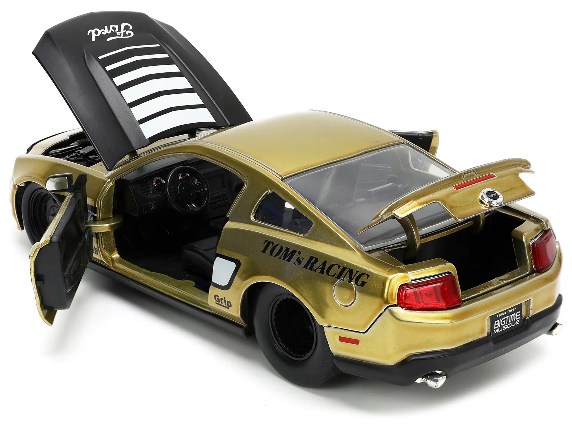 2010 Ford Mustang GT Gold Metallic with Black Graphics and Hood "Tom's Racing" "Bigtime Muscle" Series 1/24 Diecast Model Car by Jada Jada