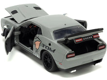 Load image into Gallery viewer, 2015 Dodge Challenger Hellcat Gray with &quot;Tom&quot; Graphics and Jerry Diecast Figure &quot;Tom and Jerry&quot; &quot;Hollywood Rides&quot; Series 1/24 Diecast Model Car by Jada Jada
