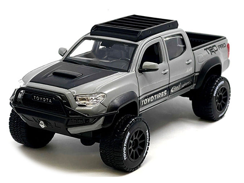 2023 Toyota Tacoma TRD PRO Off Road Pickup Truck Cement Gray with Black Hood and Roofrack "Maisto Design" Series 1/27 Diecast Model Car by Maisto Maisto