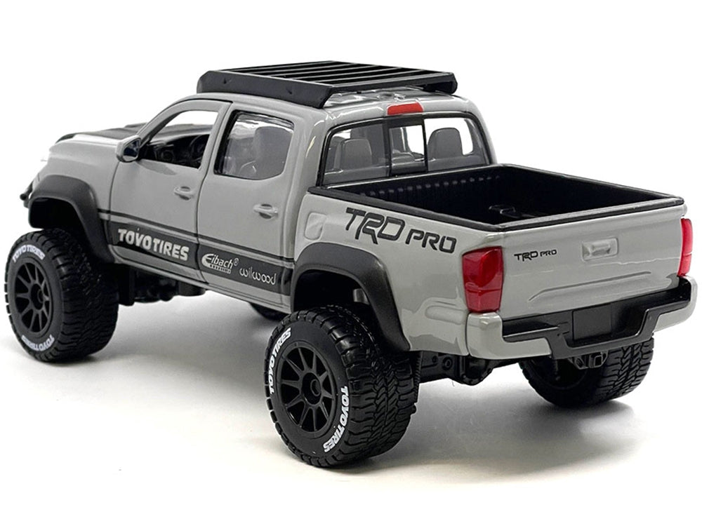 2023 Toyota Tacoma TRD PRO Off Road Pickup Truck Cement Gray with Black Hood and Roofrack "Maisto Design" Series 1/27 Diecast Model Car by Maisto Maisto