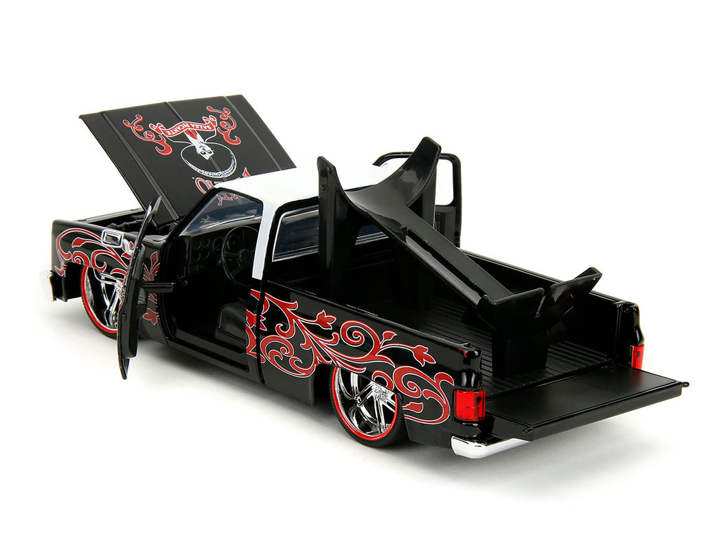 1985 Chevrolet C-10 Pickup Truck Black with White Top and Graphics with Charro Man Diecast Figure 