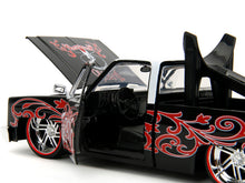 Load image into Gallery viewer, 1985 Chevrolet C-10 Pickup Truck Black with White Top and Graphics with Charro Man Diecast Figure &quot;Tapatio&quot; 1/24 Diecast Model Car by Jada Jada
