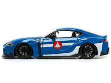 Load image into Gallery viewer, 2020 Toyota Supra Blue with Graphics and Max Sterling Diecast Figurine &quot;Robotech&quot; &quot;Hollywood Rides&quot; Series 1/24 Diecast Model Car by Jada Jada
