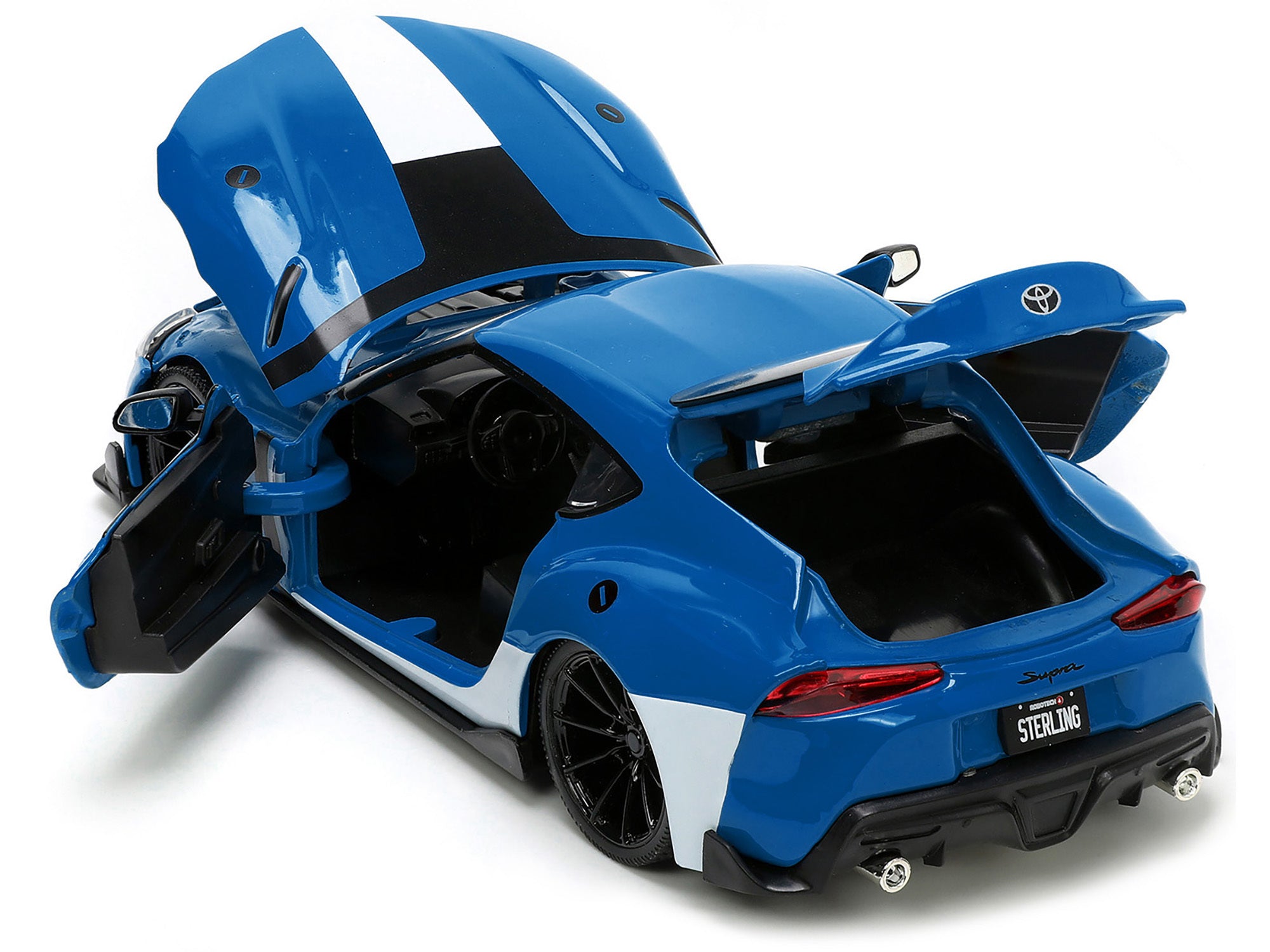 2020 Toyota Supra Blue with Graphics and Max Sterling Diecast Figurine "Robotech" "Hollywood Rides" Series 1/24 Diecast Model Car by Jada Jada