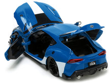 Load image into Gallery viewer, 2020 Toyota Supra Blue with Graphics and Max Sterling Diecast Figurine &quot;Robotech&quot; &quot;Hollywood Rides&quot; Series 1/24 Diecast Model Car by Jada Jada
