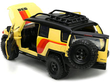 Load image into Gallery viewer, Toyota FJ Cruiser #938 Cream with Matt Black Top with Roof Rack and Stripes &quot;KC Hilites&quot; with Extra Wheels &quot;Just Trucks&quot; Series 1/24 Diecast Model Car by Jada Jada
