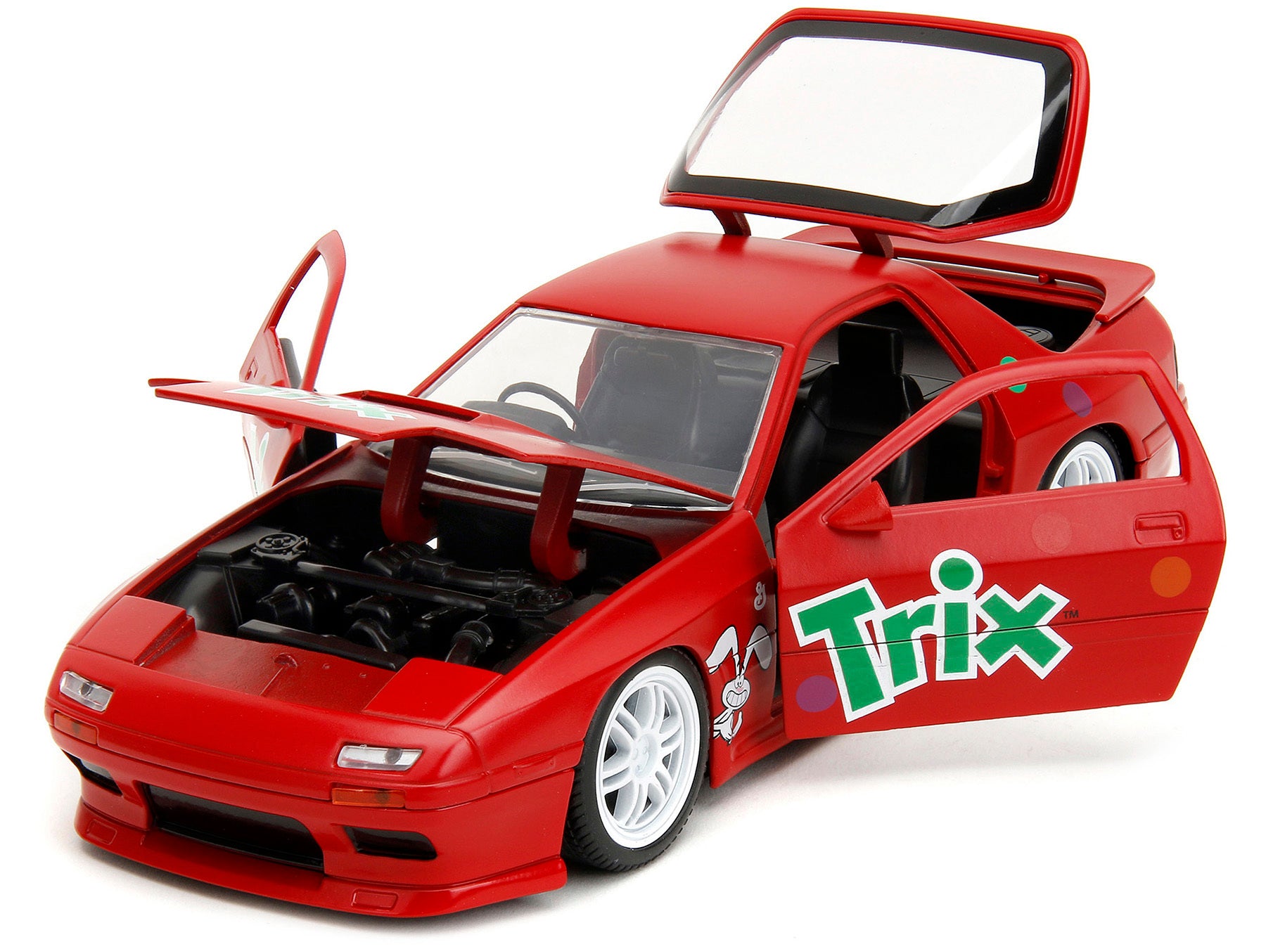 1985 Mazda RX-7 RHD (Right Hand Drive) Red with Graphics and Trix Rabbit Diecast Figure "Trix Cereal" "Hollywood Rides" Series 1/24 Diecast Model Car by Jada Jada