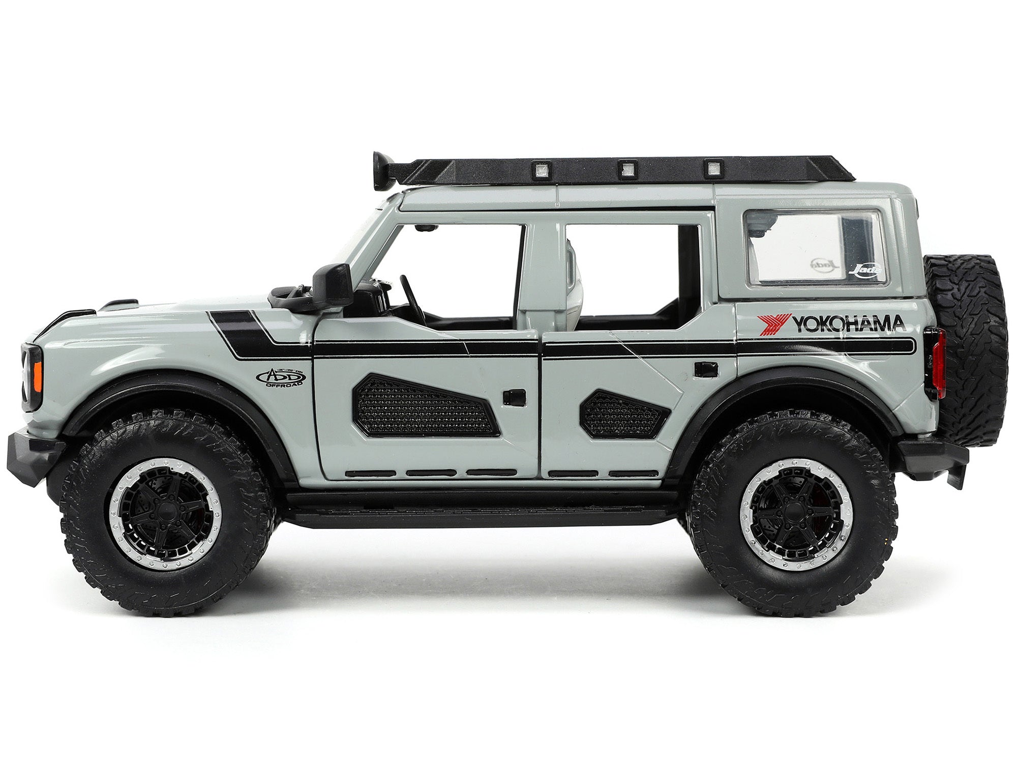 2021 Ford Bronco Gray with Black Stripes with Roof Rack "Own the Night" "Just Trucks" Series 1/24 Diecast Model Car by Jada Jada