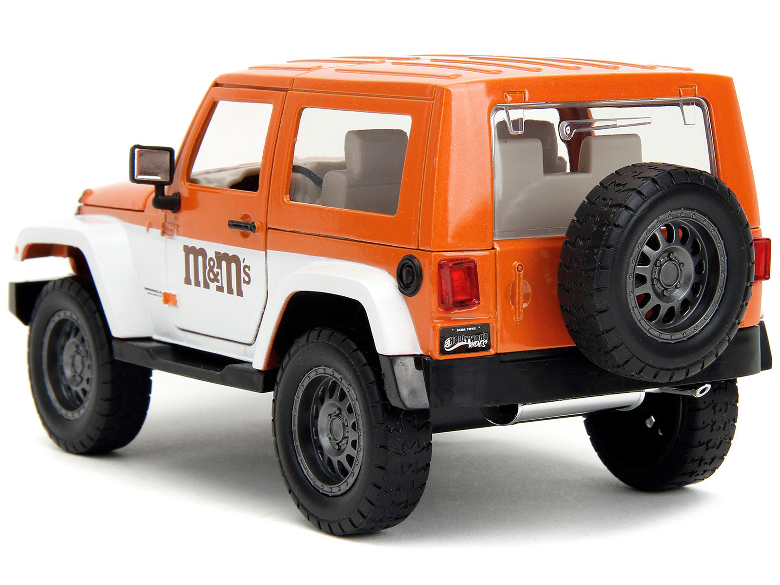 2017 Jeep Wrangler Orange Metallic and White and Orange M&M Diecast Figure "M&M's" "Hollywood Rides" Series 1/24 Diecast Model Car by Jada Jada