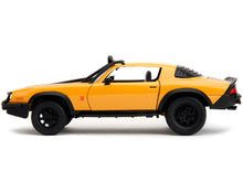 Load image into Gallery viewer, 1977 Chevrolet Camaro Off-Road Version &quot;Bumblebee&quot; Yellow Metallic with Black Stripes and Transformers Logo Diecast Statue &quot;Transformers: Rise of the Beasts&quot; (2023) Movie &quot;Hollywood Rides&quot; Series 1/24 Diecast Model Car by Jada Jada
