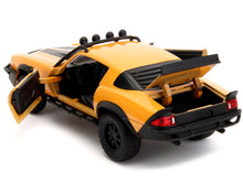 Load image into Gallery viewer, 1977 Chevrolet Camaro Off-Road Version &quot;Bumblebee&quot; Yellow Metallic with Black Stripes and Transformers Logo Diecast Statue &quot;Transformers: Rise of the Beasts&quot; (2023) Movie &quot;Hollywood Rides&quot; Series 1/24 Diecast Model Car by Jada Jada
