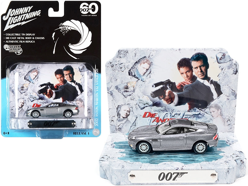 2002 Aston Martin V12 Vanquish Tungsten Silver Metallic with Collectible Tin Display "007" (James Bond) "Die Another Day" (2002) Movie "60 Years Of Bond" 1/64 Diecast Model Car by Johnny Lightning Johnny Lightning