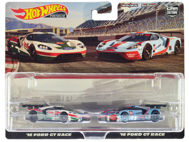 2016 Ford GT Race #67 White with Green and Red Stripes and 2016 Ford GT Race #69 Light Blue Metallic with Orange Stripes 