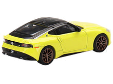 Load image into Gallery viewer, 2023 Nissan Z Proto Spec Ikazuchi Yellow with Black Top Limited Edition to 3000 pieces Worldwide 1/64 Diecast Model Car by True Scale Miniatures True Scale Miniatures
