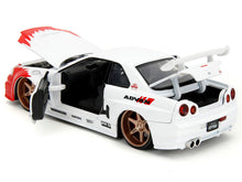 Load image into Gallery viewer, 2002 Nissan Skyline GT-R (R34) RHD (Right Hand Drive) White with Red Graphics and Ryu Diecast Figure &quot;Street Fighter&quot; Video Game &quot;Anime Hollywood Rides&quot; Series 1/24 Diecast Model Car by Jada Jada
