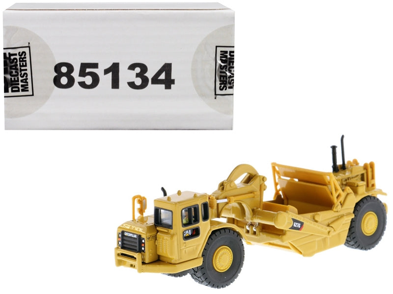 CAT Caterpillar 627G Wheeled Scraper Tractor with Operator "High Line" Series 1/87 (HO) Scale Diecast Model by Diecast Masters Diecast Masters